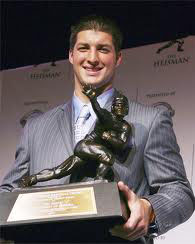 Tim Tebow with Heisman Trophy
